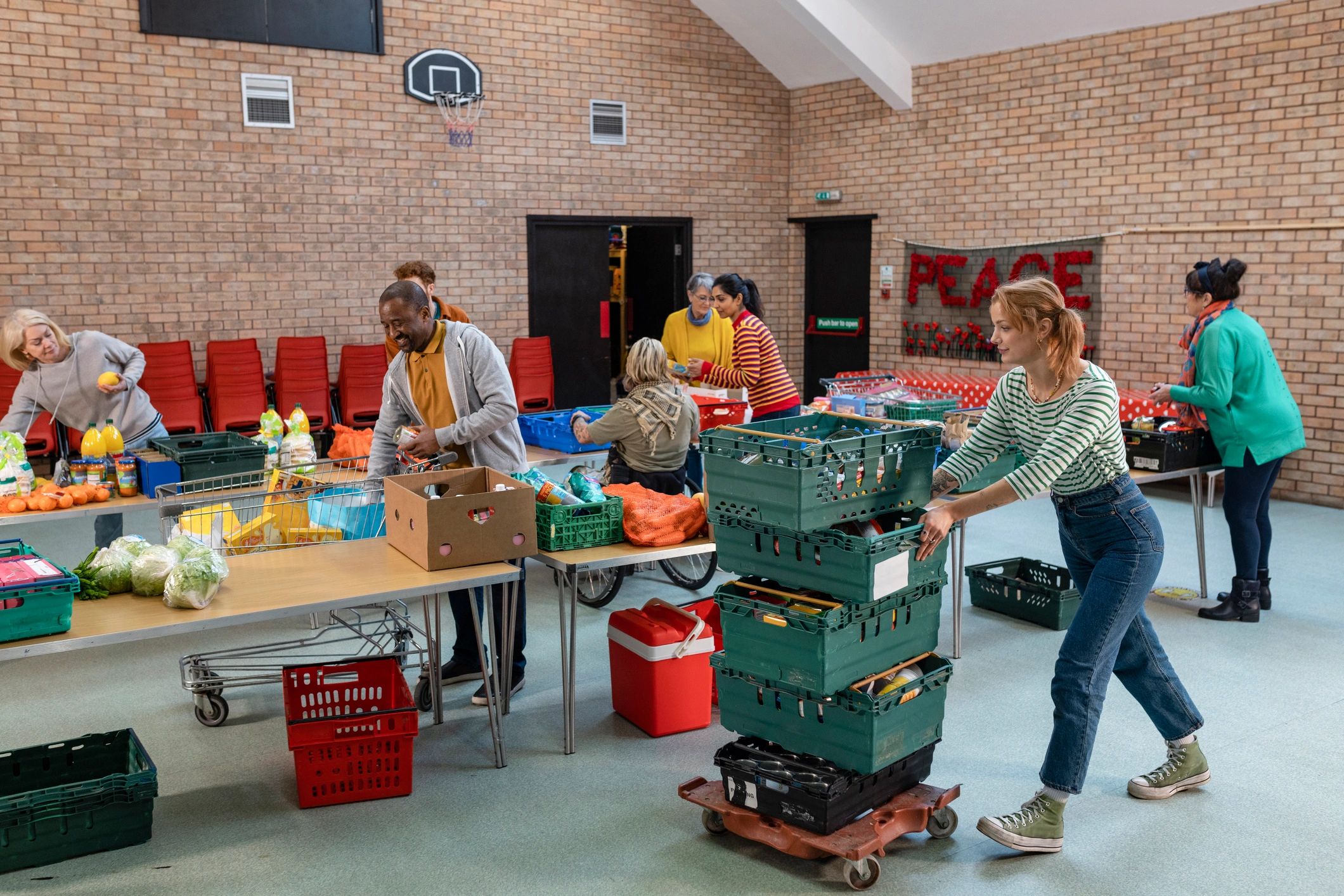 Volunteers organizing food donations at a community outreach center